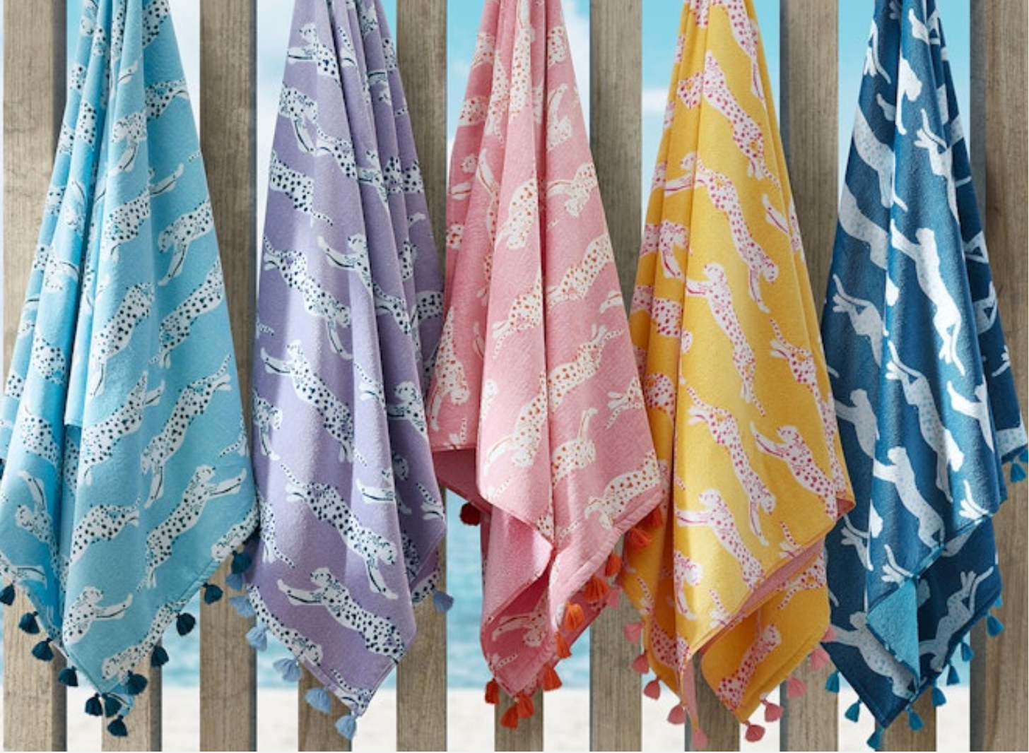 Leaping Leopard Beach Towel